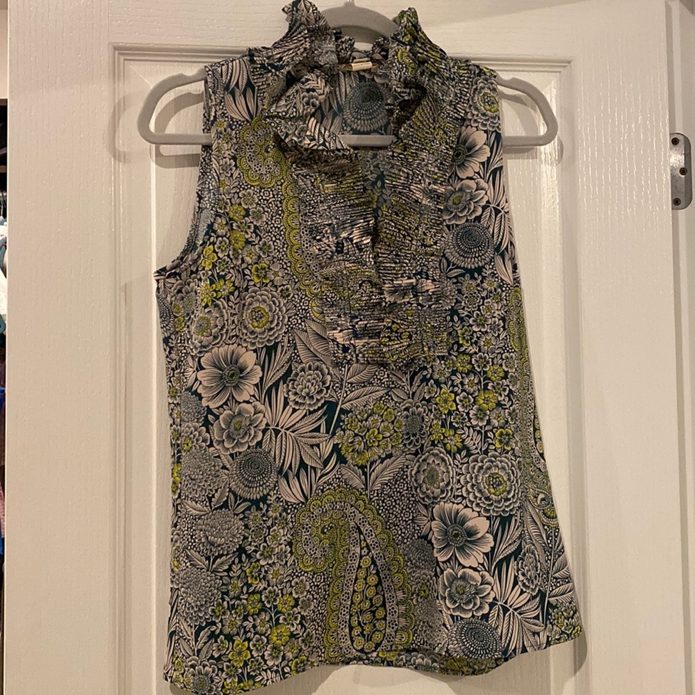 JCrew. Size 4, sleeveless ruffle neck dress shirt. Colors: teal, cream, yellow.